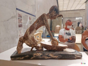 Grinding wheat man statue NMEC Egypt Fun Tours